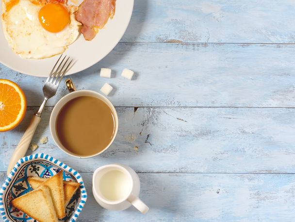 Background breakfast fried eggs, coffee and toast - Фото, зображення
