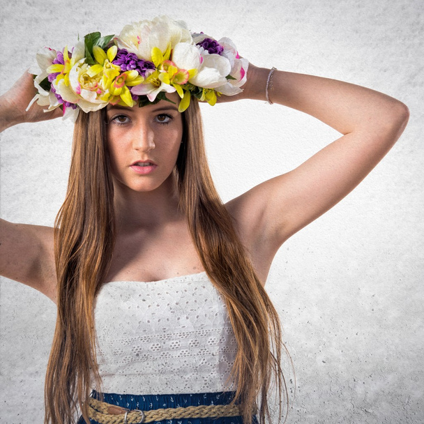 Model woman with crown of flowers - Фото, зображення