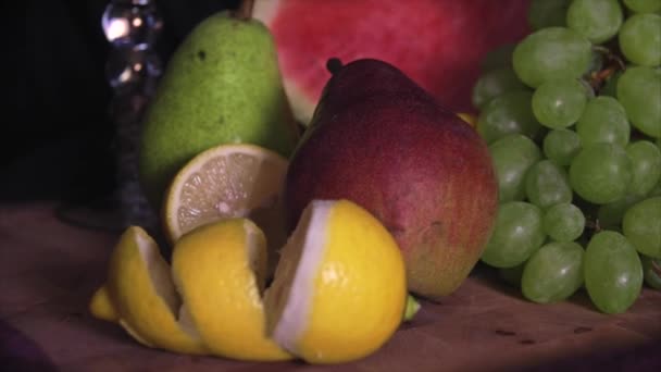 Still life with fruits on wood  - Кадры, видео