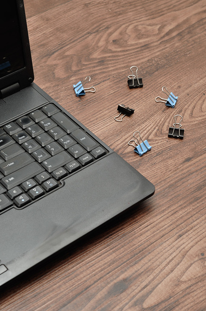 Laptop with butterfly clips - Photo, Image