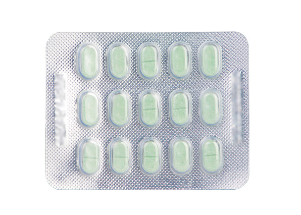 Green tablet in  blister pack - Photo, Image