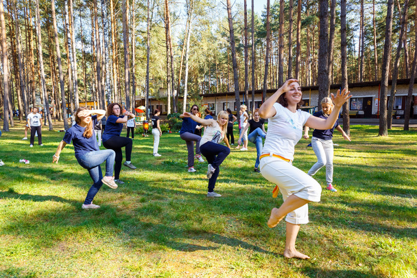 Group of capoeira students with master teacher - Foto, Bild