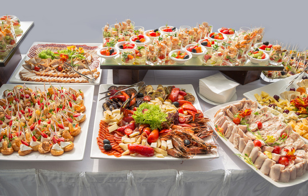 Banquet Table in restaurant served with different meals. - Photo, Image