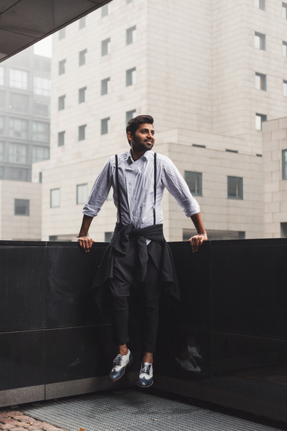 Handsome Indian man posing in an urban context - Photo, Image