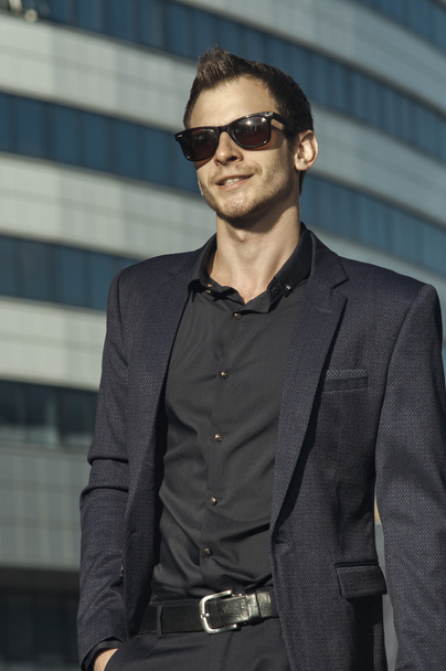 smiling businessman in a suit - Fotoğraf, Görsel