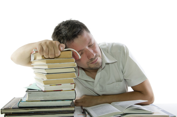 Man sleep and reading book in the library - Φωτογραφία, εικόνα