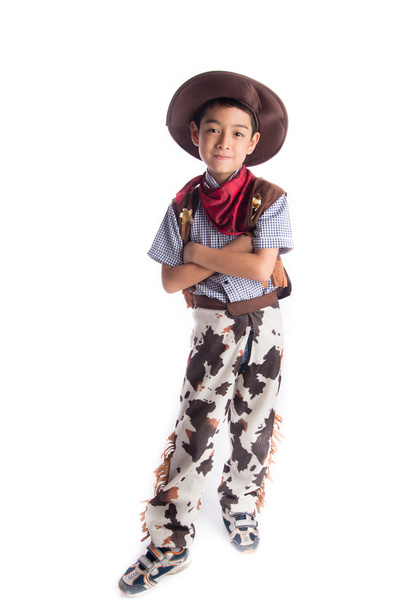 Kisfiú cowboy ruha fehér háttér - Fotó, kép