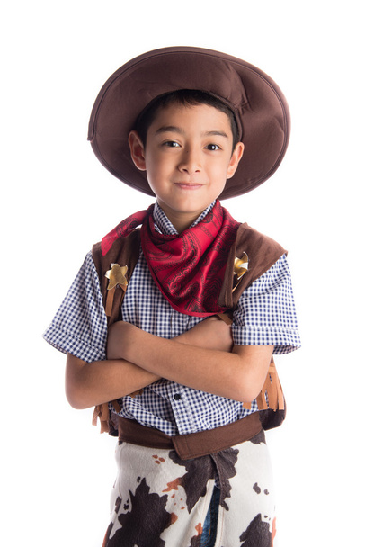 Kleiner Junge im Cowboy-Kostüm auf weißem Hintergrund - Foto, Bild