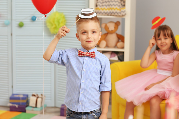 Children's funny birthday party in decorated room - Photo, Image
