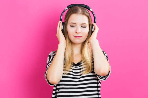 young woman with headphone - Photo, image