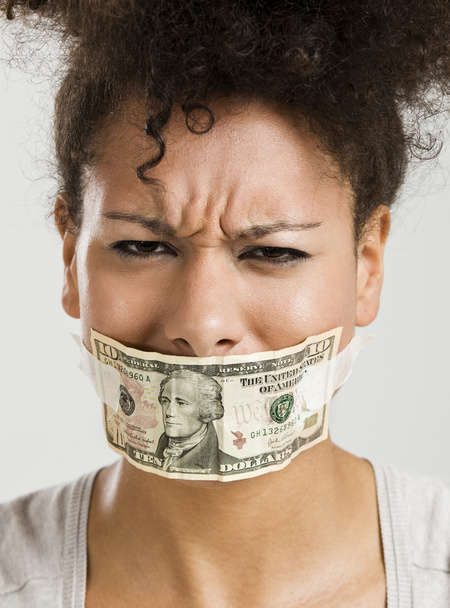 Covering mouth with a dollar banknote - Photo, Image