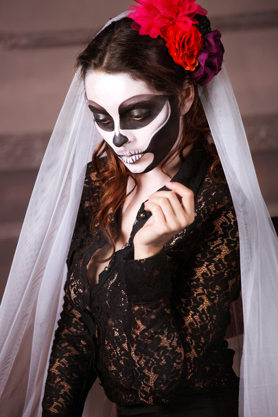 Beautiful woman painted as skeleton - Фото, изображение