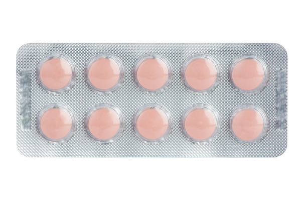 Ruskea tabletti läpipainopakkauksessa näytä lääkkeen käsite
 - Valokuva, kuva