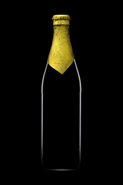 Bottle of beer with golden foil isolated on black background - Photo, image