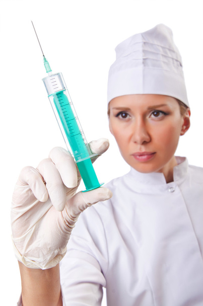 Kobieta lekarz ze strzykawką na białym - Zdjęcie, obraz