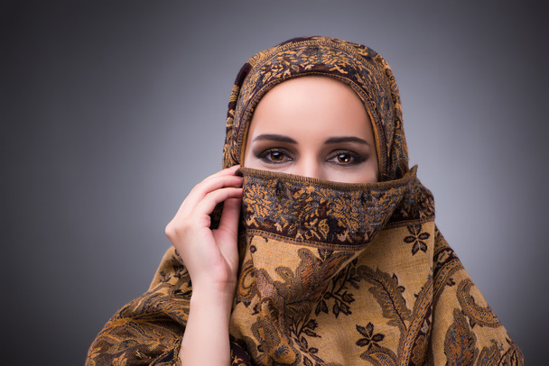 Young woman in traditional muslim clothing - 写真・画像