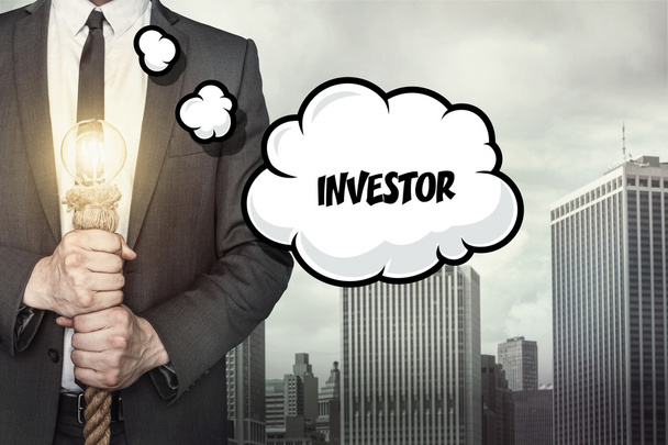 Investor text on speech bubble with businessman - Photo, Image