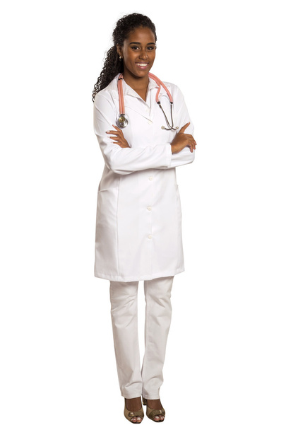 美しいアフリカ ブラジルの医師または白い背景に分離した腕を組んで看護師の肖像画 - 写真・画像