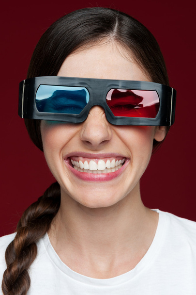 Merry young woman in 3d glasses - Photo, Image