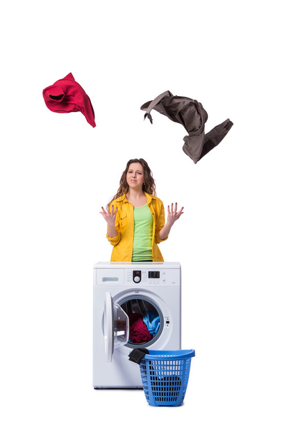 Woman feeling sressed after doing dirty laundry - Foto, afbeelding