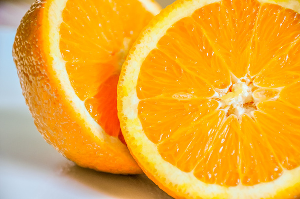 Closeup of orange sliced in half - Photo, Image