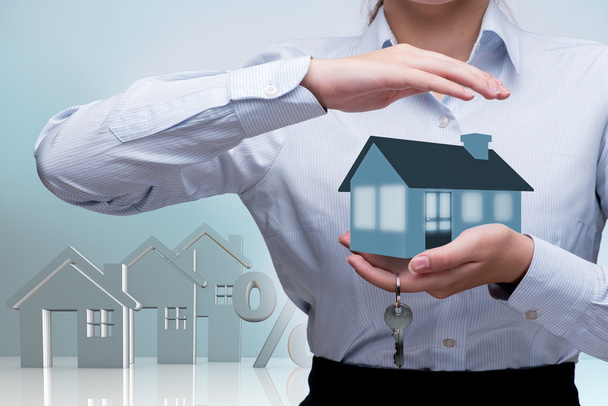Businesswoman in real estate mortgage concept - Photo, Image