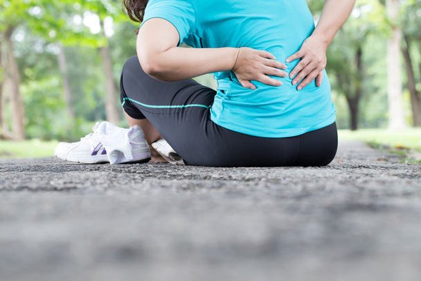 Lesión deportiva. dolor de espalda después del ejercicio
 - Foto, imagen