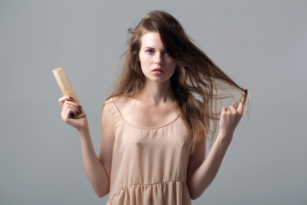 sexy young pretty woman with hairbrush - Zdjęcie, obraz