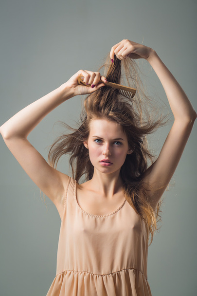 sexy young pretty woman with hairbrush - Φωτογραφία, εικόνα