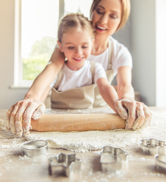 Mother and daughter baking - Photo, image