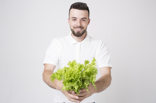 man holding salads close up. concept. Superfoods - Фото, зображення