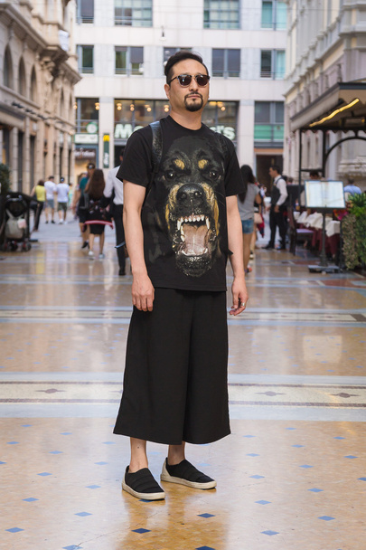 Fashionable man posing in Milan, Italy - 写真・画像