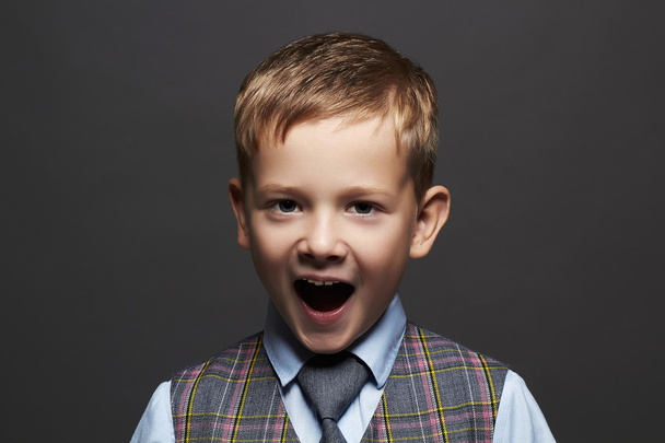 kids emotion.fashionable little boy.stylish funny child in suit and tie - Photo, Image