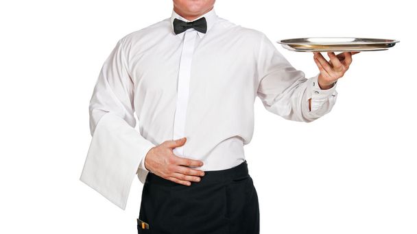 Camarero sosteniendo bandeja. aislado sobre fondo blanco
. - Foto, Imagen
