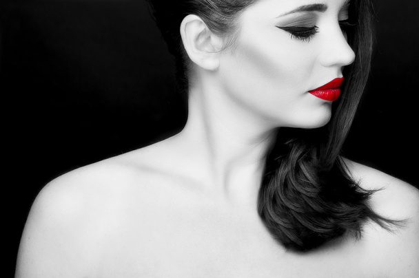 Gorgeous young woman with long eyelashes and red lips.  - Fotó, kép