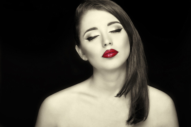 Gorgeous young woman with long eyelashes and red lips.  - 写真・画像