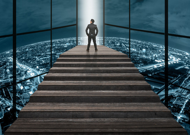 Businessman climbed on top of stairs  - Photo, Image