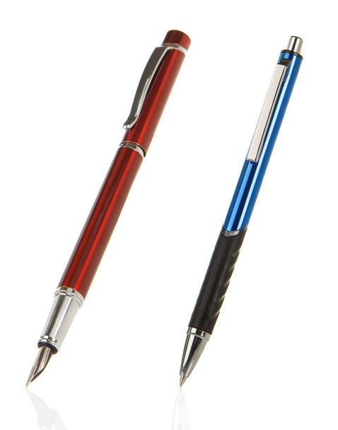 Red and blue silver pens on white - Фото, изображение