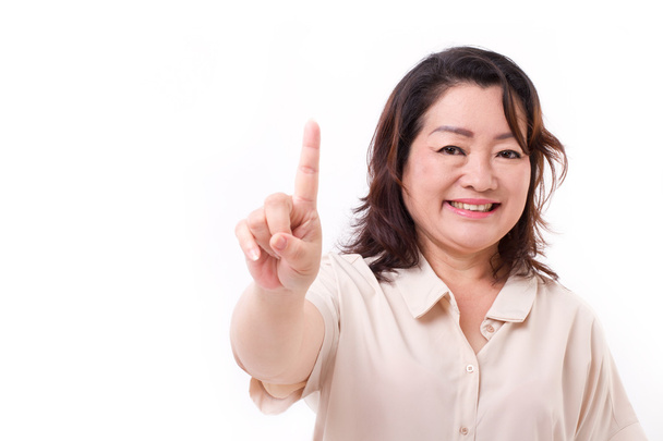 happy, confident middle aged woman pointing up one finger, numbe - Fotó, kép