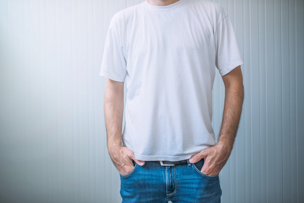 Casual adult male wearing blank white t-shirt - Fotoğraf, Görsel