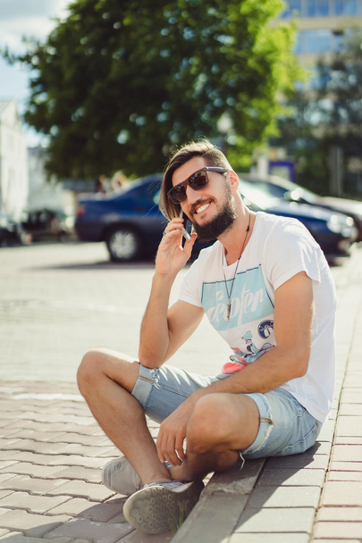  young man with mobile phone  - Fotoğraf, Görsel