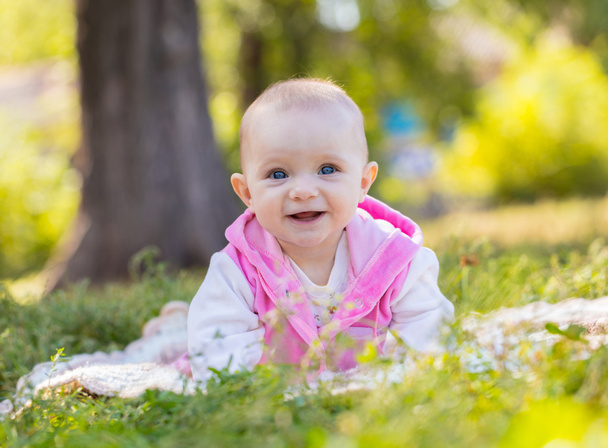 portrait of a smiling baby girl  - Fotó, kép