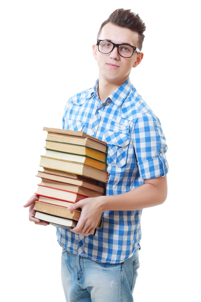 joven estudiante sosteniendo libros
 - Foto, Imagen