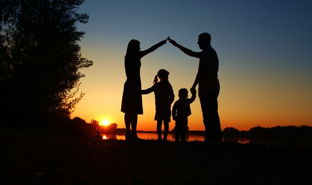 silhouette of a happy family - Foto, Imagen