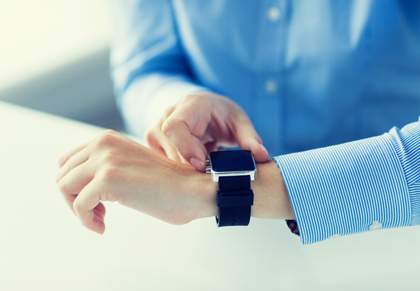 close up of hands setting smart watch - 写真・画像