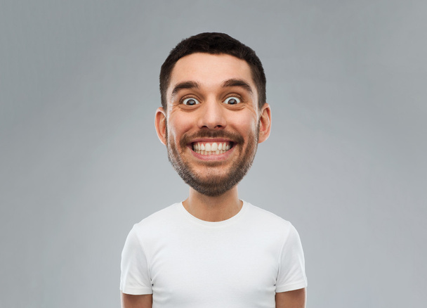 man with funny face over gray background - Foto, immagini