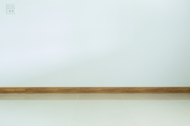 empty room interior, white tile floor and white mortar wall - Фото, зображення