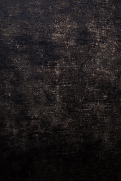 Dark scratched grunge wooden board - Photo, image