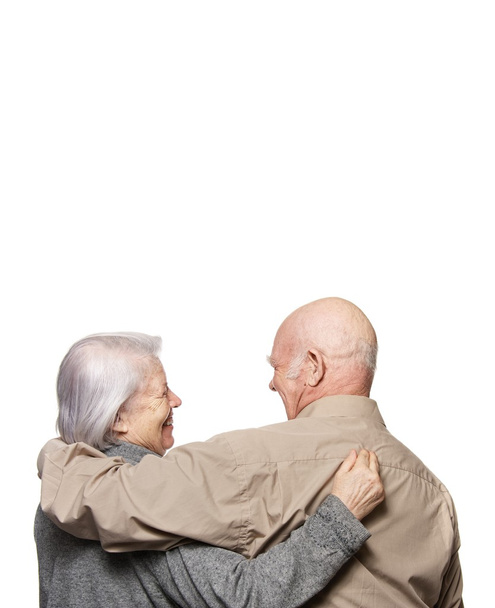 Birbirlerini kucaklayan mutlu bir çiftin portresi. - Fotoğraf, Görsel