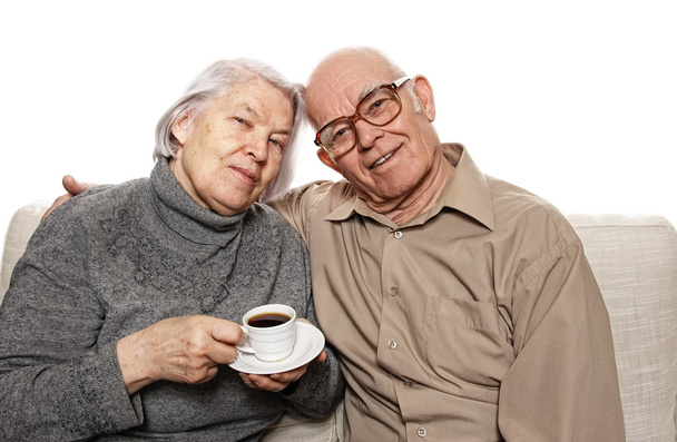 Счастливая сеньора пара пьет кофе
 - Фото, изображение